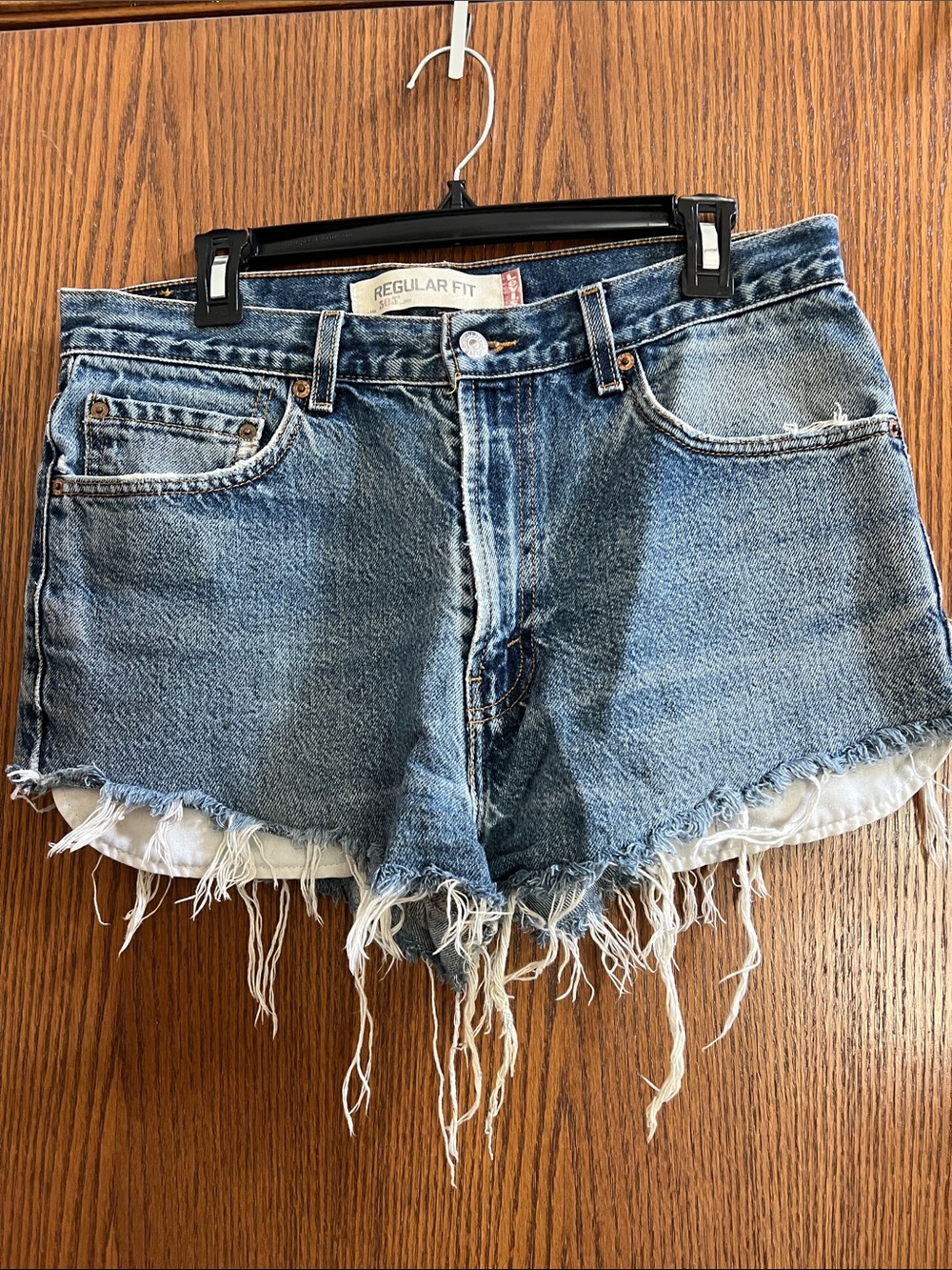 Levi's Medium Blue Distressed Cutoff Denim Shorts